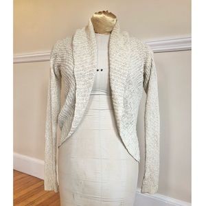 Shrug style sweater, ivory with golden flecks.